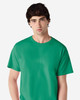 A green Gildan Ultra Cotton adult t-shirt on a male model. The shirt has a standard crew neck and short sleeves.