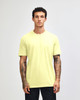 A unisex short sleeve T-shirt in vibrant yellow, featuring a simple design and a branding logo.