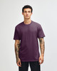 A unisex short sleeve T-shirt in a deep purple colour, featuring a relaxed fit and a visible logo.