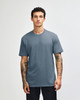 A unisex CVC short sleeve t-shirt in a blue colour, featuring a logo on the front.