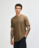A unisex short sleeve t-shirt in khaki, featuring a simple design and a logo on the front.