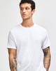 A unisex short sleeve T-shirt in white, featuring a simple design and a logo on the front.
