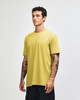 A unisex short sleeve t-shirt in a vibrant yellow colour with a casual fit, displayed on a model.