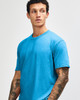A unisex CVC short sleeve t-shirt in bright blue, featuring a relaxed fit and no visible branding.