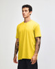 A unisex short sleeve t-shirt in bright yellow, featuring a relaxed fit and a logo.