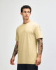 A unisex short sleeve t-shirt in a soft yellow colour, featuring a relaxed fit and a logo.