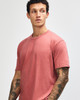 A unisex short sleeve T-shirt in a terracotta colour, featuring a relaxed fit and no visible branding.