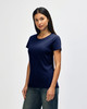 A navy Gildan Heavy Cotton Ladies' T-Shirt displayed on a model, featuring a simple design and short sleeves.