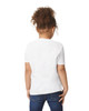 A child wearing a white Gildan Heavy Cotton Toddler T-Shirt, viewed from the back, paired with blue jeans.