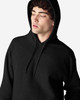 A black Gildan Softstyle adult hooded sweatshirt with a drawstring hood and a front pocket.