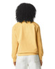 A back view of a yellow adult crewneck sweatshirt with a branded logo. The model wears light-coloured pants.