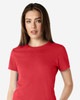 A red Gildan Softstyle ladies' t-shirt displayed on a model with a plain background. It features a logo on the shirt.