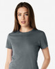 A grey ladies' t-shirt with a round neckline, featuring a logo on the sleeve. The model is looking directly at the camera.
