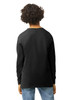 A back view of a black long sleeve youth t-shirt with a simple design and a logo at the neckline.