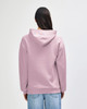 A pink unisex hooded sweatshirt featuring a spacious hood and a relaxed fit, with a visible logo on the back.