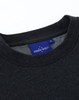 A dark grey crew fleece jumper featuring a round neckline and a branded label inside.