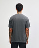 A unisex heavyweight cotton T-shirt in a garment-dyed grey, featuring a plain back and relaxed fit.