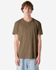 A unisex henley t-shirt in a khaki colour, featuring a round neckline and buttons, displayed on a model.