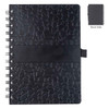 A black spiral-bound notebook featuring a textured cover and an elastic band for closure. The back side is visible.