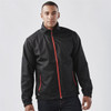 A black jacket with red zip and accents, featuring a logo, displayed on a model.