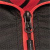 A close-up of a zip on a black thermal jacket featuring red accents and a logo.