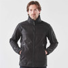 A men's black softshell jacket with a full zip, featuring zippered pockets and a stand-up collar.