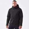 A black softshell jacket features a hood, zippered pockets, and a branding logo. Suitable for outdoor wear.
