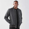 A men's thermal jacket in dark grey with a quilted pattern and a front zip closure. Features a logo on the chest.