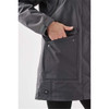 A grey Women's Fairbanks 5-in-1 System Jacket with a hand in a front pocket. The jacket features a logo.