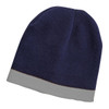 A navy blue beanie with a grey border at the bottom, featuring a logo.