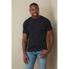 A fitted black men's T-shirt displayed on a model, paired with blue jeans. The shirt features a logo.