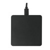 A square wireless charging pad in black, featuring a connection cable at one edge. The surface has a matte finish.