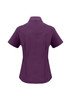 A purple women's short sleeve button-up shirt with a collar and a slightly tailored fit, featuring a logo.