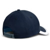 A navy blue cap with a white front panel and a green adjustable strap at the back. It features a logo.