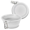 A silicone collapsible pet bowl in white with a carabiner for easy attachment. Features a smooth, circular design.
