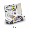 A model police car made from card stock, featuring blue and yellow markings, alongside its flat template for assembly.
