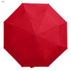 A red umbrella featuring an octagonal shape and a central opening mechanism, with a logo present.