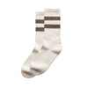 A pair of cream socks featuring two brown stripes and a branding logo.