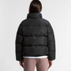 A puffer jacket in black with a high collar and a puffy design, viewed from the back.