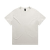 A heavy faded tee in a light cream colour, featuring a crew neckline and short sleeves, with a logo on the label.