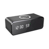 A black wireless charging speaker featuring a digital clock display and a speaker grille. It has a logo on the front.