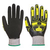 A pair of black gloves with yellow accents and textured grip, featuring a logo on the cuff.