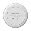 A round, white wireless charger with a smooth surface and a logo on the underside.