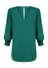 A green Cleo V Neck shirt with puffed sleeves and a smocked cuff detail, featuring a keyhole back.