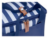 A navy cooler bag featuring white stripes, zip closure, and leather accents on the handle.