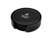 A round black coaster set with a matching holder, featuring a logo on the top coaster.