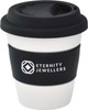 A reusable ceramic mug in white with a black silicone lid and sleeve, featuring a logo.