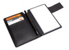 A black leather pocket jotter featuring a notepad, a pen, and spaces for cards.
