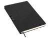 A black A5 notebook with a smooth cover, featuring an elastic strap and a ribbon bookmark.