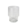 A clear, ribbed glass tumbler with a thick base, ideal for beverages. Features a subtle branding logo.